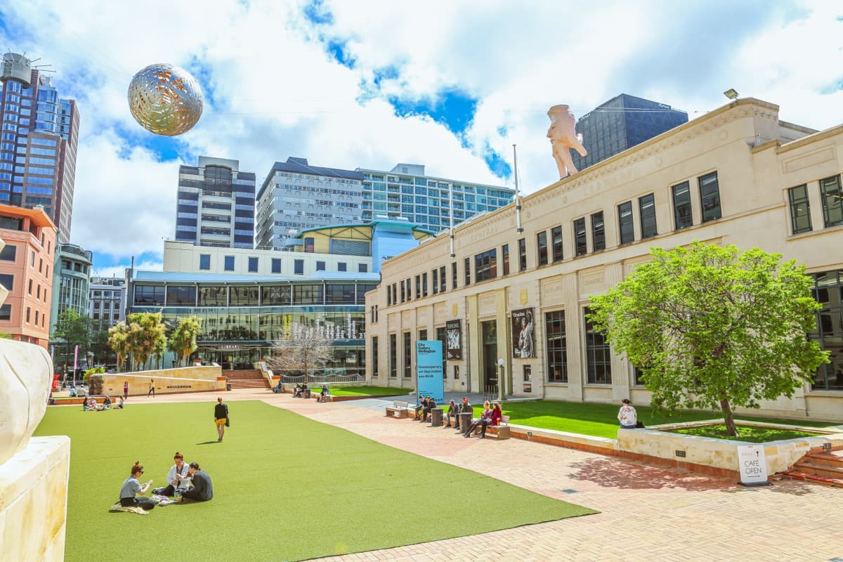 Te Ngākau Civic Square is where Wellington's culture converges. The Central Library, Michael Fowler Centre, and Town Hall all frame this public space, with the City-to-Sea Bridge — designed by Rewi Thompson and artist Paratene Matchitt — connecting you straight through to the waterfront and Whairepo Lagoon. It's civic architecture with serious personality. One of those spots that reminds you this little capital punches well above its weight.